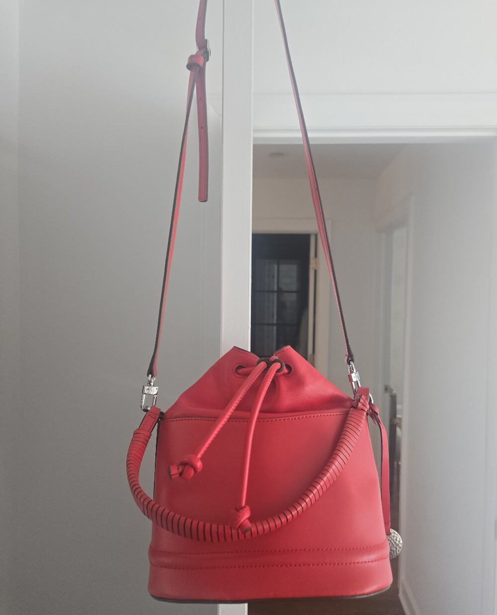 STAUD Red Leather Drawstring Bucket Crossbody Bag